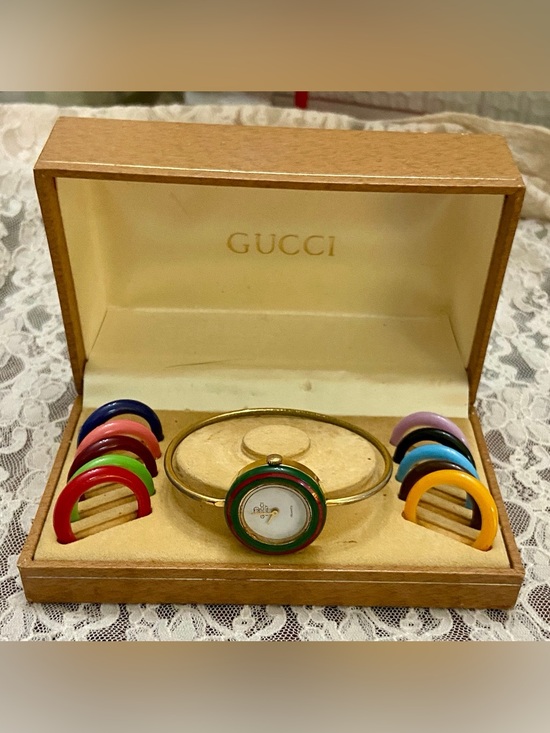 Gucci Accessories - Gucci 12-pc Interchangeable Gold Ladies Watch with Original Box